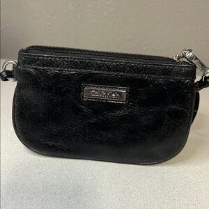 Calvin Klein Black Leather Clutch with Silver Accents